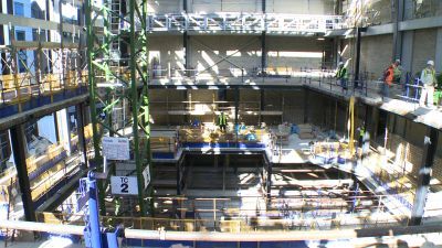 Jonathan Vaughan stood in Concert Hall construction wearing hard hat